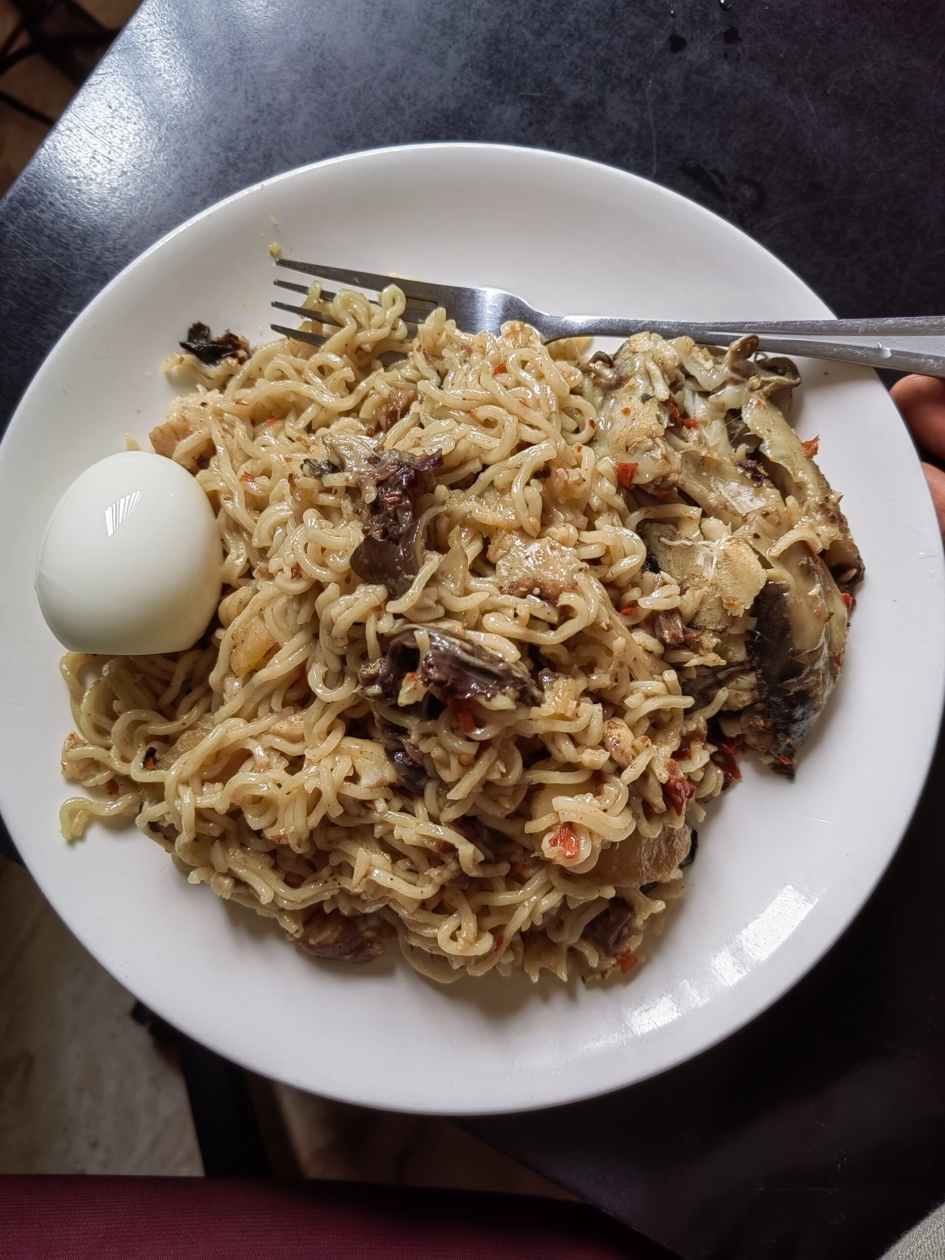 Indomie and egg with BBQ fish